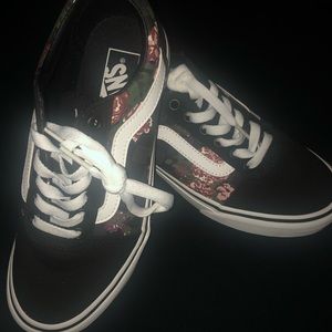 Brand new Vans with pink roses. Size is 7.